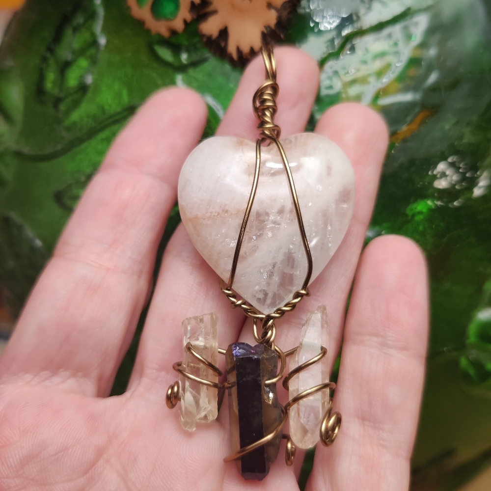 Wire wrapped stone necklace with a heart
